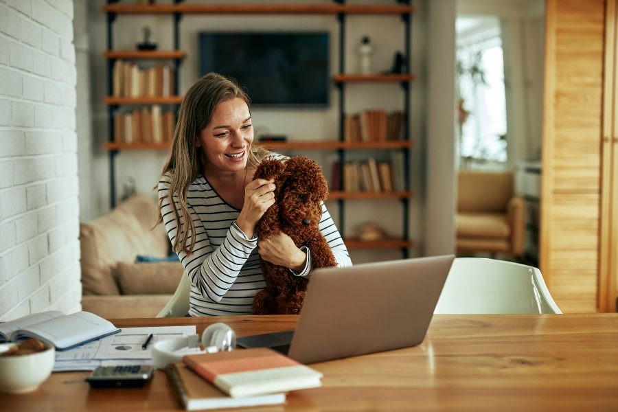 A person holding a teddy bear